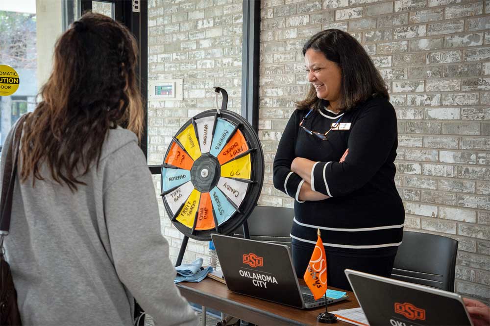 students line up to spin the prize wheel in Oklahoma City